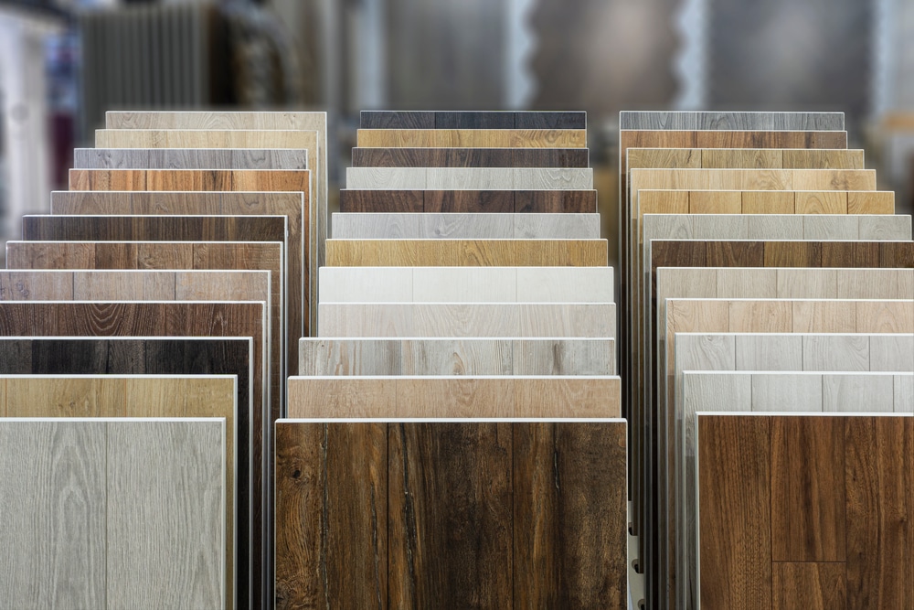 Laminate background. Samples of laminate or parquet with a pattern and wood texture for flooring and interior design. Production of wooden floors
